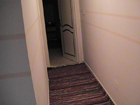  Le couloir (au fond la chambre lit double) .